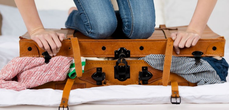 Woman-Packing-Suitcase-800x360